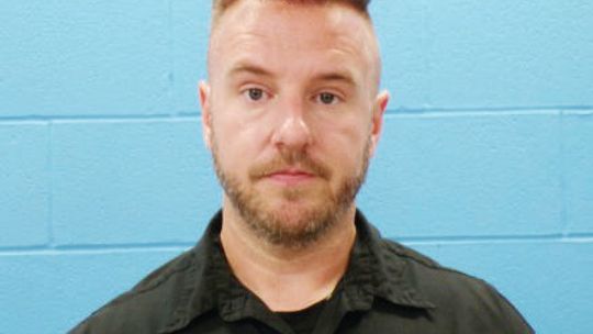 Hays County corrections officer arrested