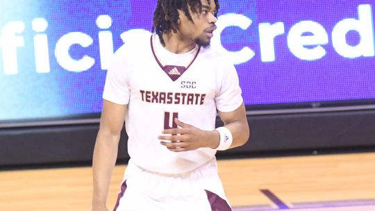 Johnson wins 100th game as Bobcats complete comeback win