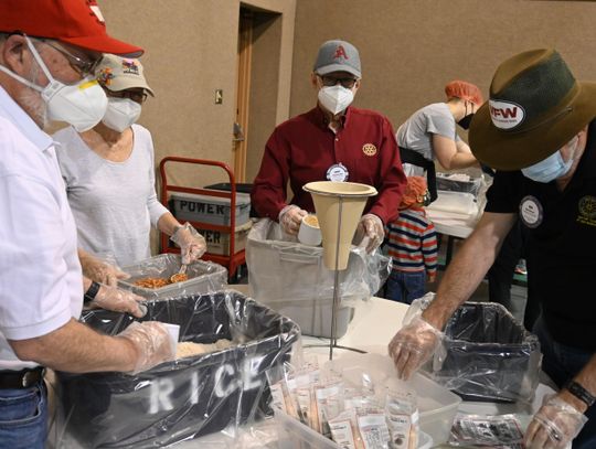 150 volunteers help Rotary pack 15,000 meals on World Food Day