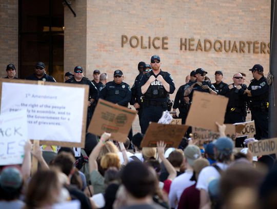 Austin City Council votes to cut police department budget by one-third, reinvest money in social services