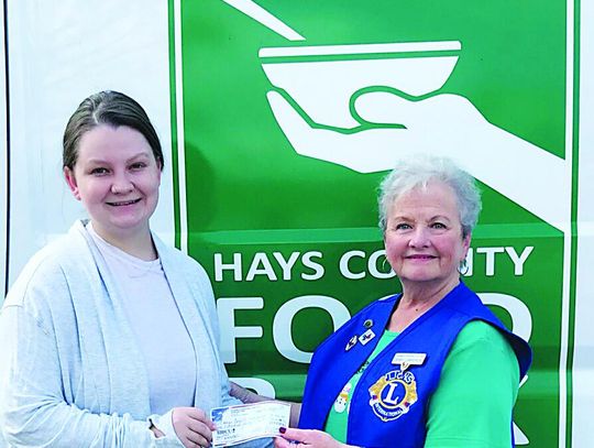 Bluebonnet Lions Club presents donation to Hays County Food Bank
