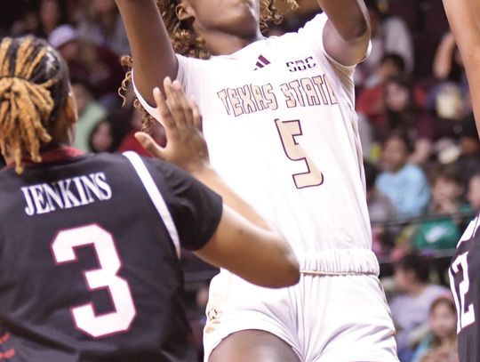 Bobcats drop home game to Trojans