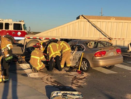 Car collides with  gravel truck in Monday morning accident