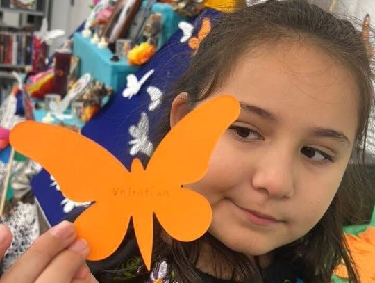 Community ofrenda and children’s classes help honor loved ones