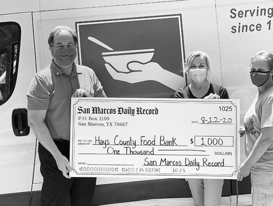 Daily Record donates to Hays County Food Bank