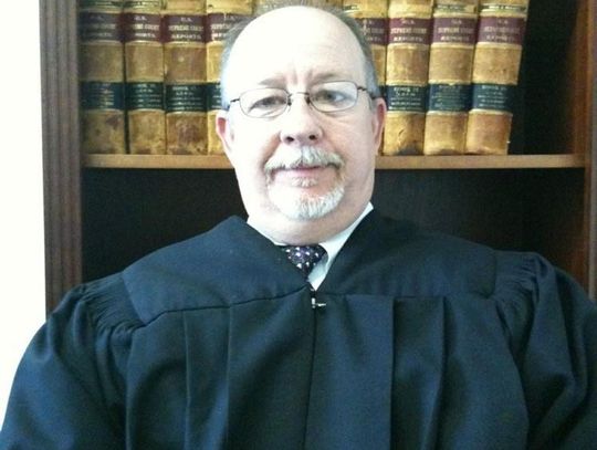 District judge appointed to state commission