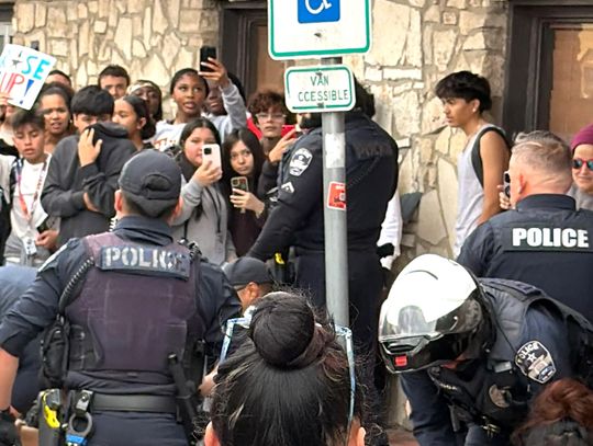 Fight between adult male and students during Buda protest leads to DA investigation