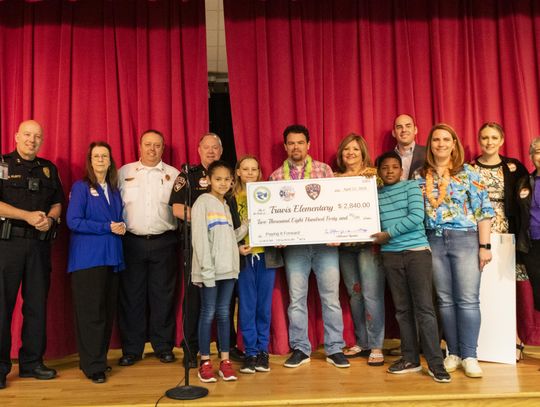 Fire, police donate to Travis Elementary