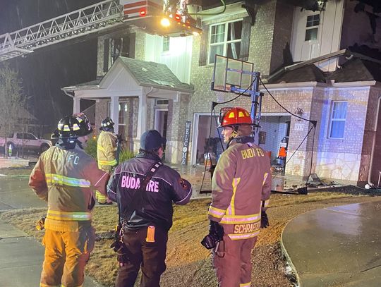 Firefighters battle Buda house fire