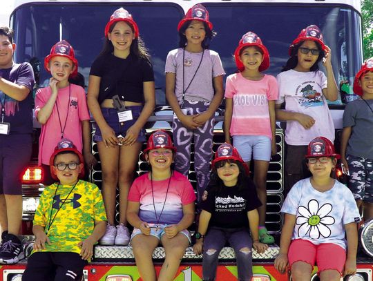 Firefighters visit children at Centro Cultural Hispano de San Marcos