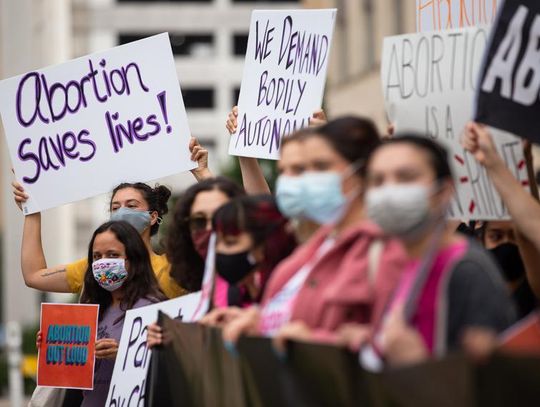 Gov. Greg Abbott signs into law one of nation’s strictest abortion measures, banning procedure as early as six weeks into a pregnancy