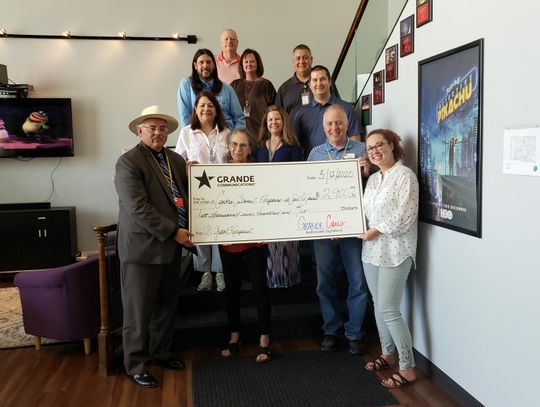 Grande Cares Club gives Centro grant