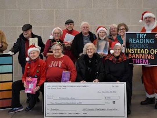 Hill Country Freethinkers Association donates to Friends of the Library