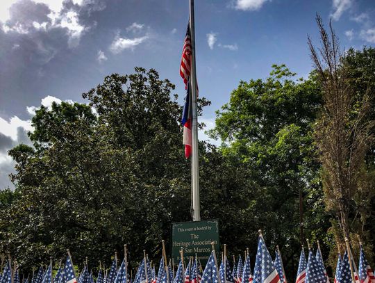 HONORING THE FLAG: American flags fly around San Marcos during Flag Day