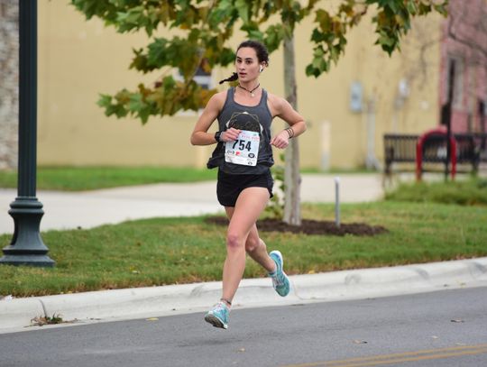 JINGLE ALL THE WAY: Runners traverse Downtown San Marcos during Santa's Jingle Bell Run