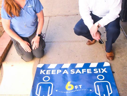 KEEPING SOCIALLY SAFE: Chamber of Commerce, city team up for downtown signs