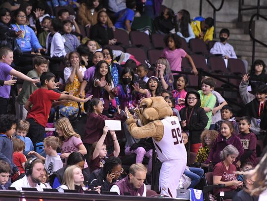 KID'S GAME RETURNS: San Marcos CISD students fill stands at Strahan Arena on Thursday