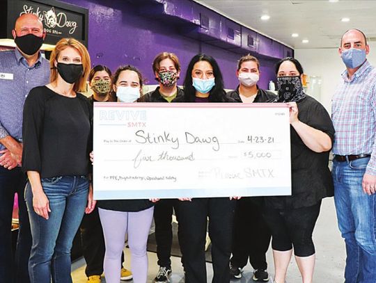 Local businesses receive Revive SMTX checks