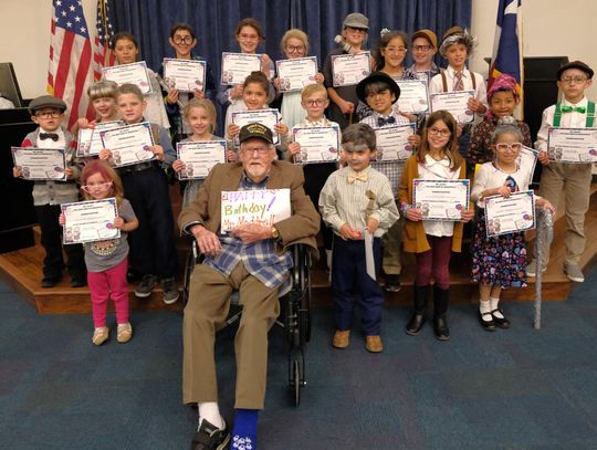 Local centenarian helps SMA celebrate 100th day of school