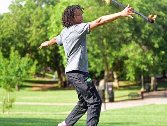 Local man fights depression through fire dancing