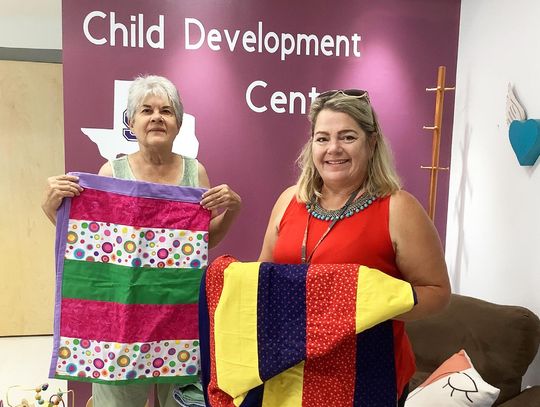 Local sewing guild presents quilted gifts