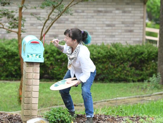 MAILBOX MASTERPIECE: Local artist spruces up neighborhood mailbox with colorful painting