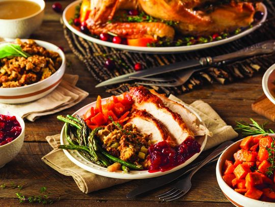 Millions stick to Thanksgiving travel plans despite warnings