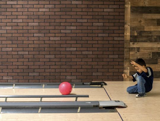 Mothers and sons go bowling