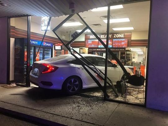 No one injured after vehicle crashes into Little Caesar's