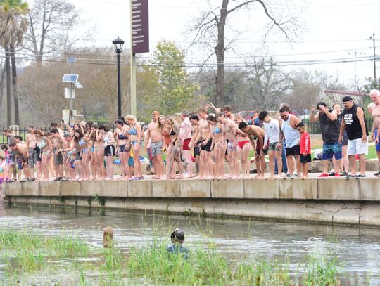 NOT-SO-POLAR PLUNGE: San Marcos residents take part in annual New Year's river splash