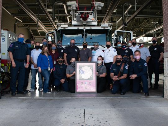 POSITIVELY PINK: SMFD presents funds raised during Breast Cancer Awareness Month