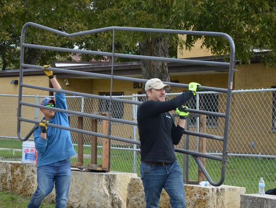 PREPPING FOR SIGHTS & SOUNDS: Volunteers help gear up for annual two-weekend holiday festival