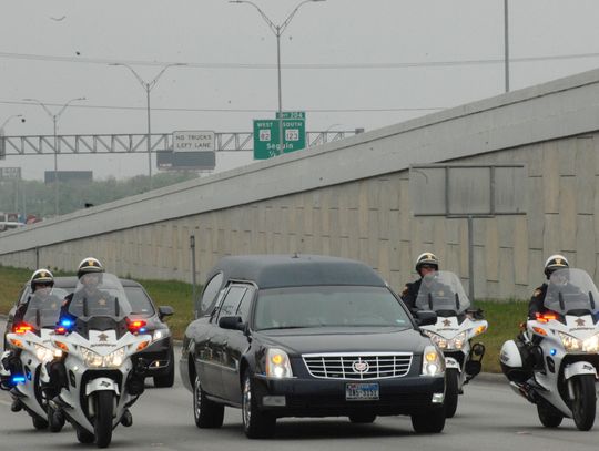 Processional for former deputy