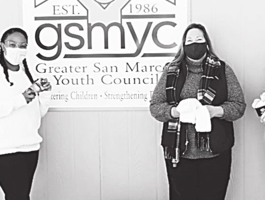 Rotary Club of San Marcos donates socks to GSMYC