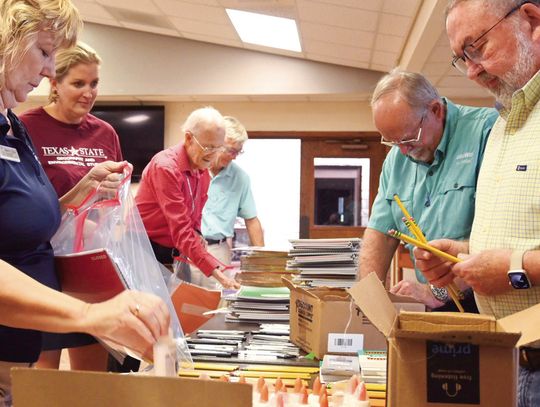 Rotary raises school supplies locally and abroad