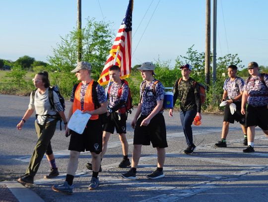 Students, veterans load up, march in footsteps of World War II heroes