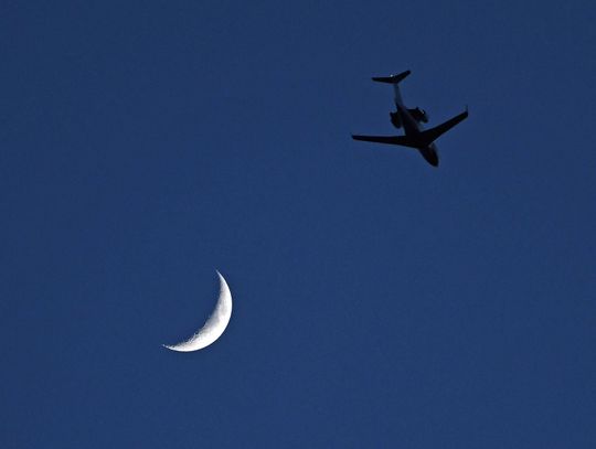 Summer moon shines in San Marcos