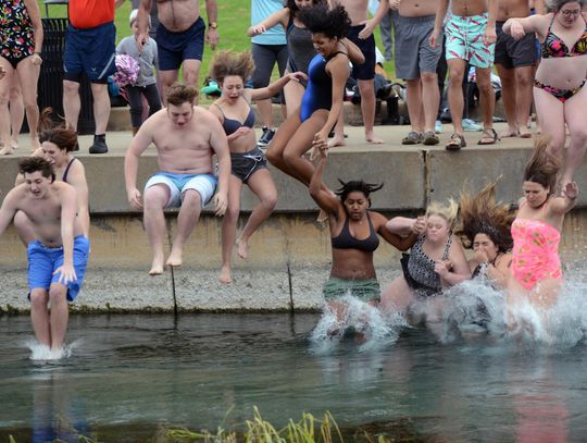 Taking the Plunge: San Marcans ring in new year in the river 