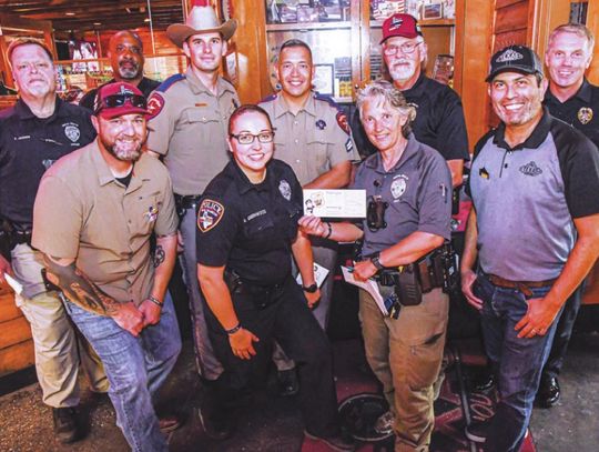 Tip-a-Cop fundraiser brings in $2K for Special Olympics Texas
