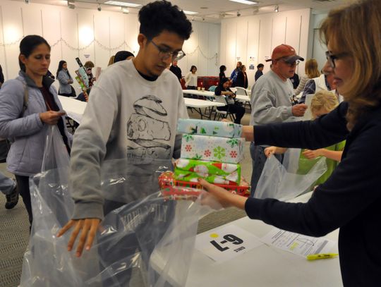 Volunteers help San Marcos  Police Department’s Blue Santa