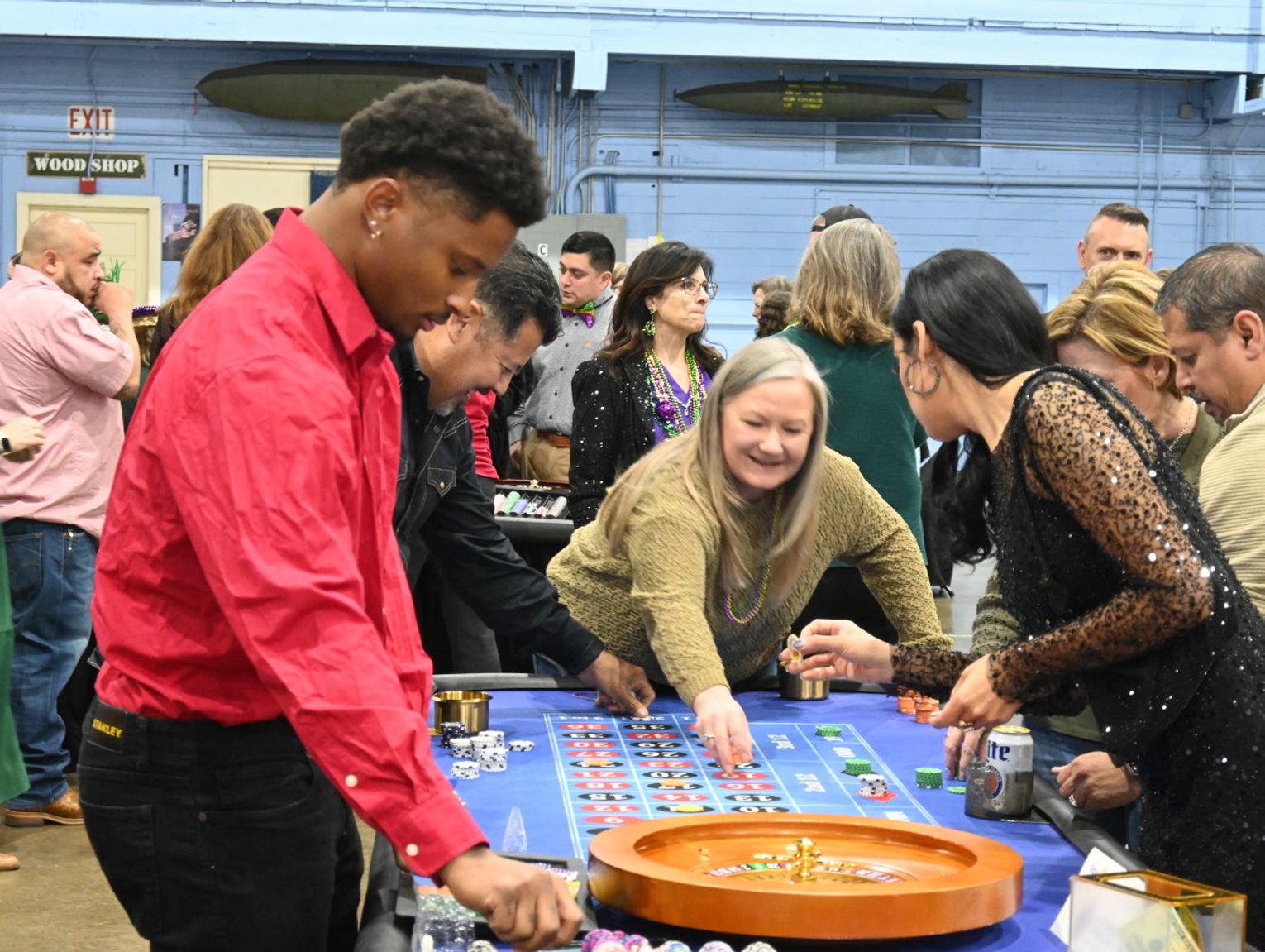 Rotary Casino Night combines Mardi Gras fun with Air Force history