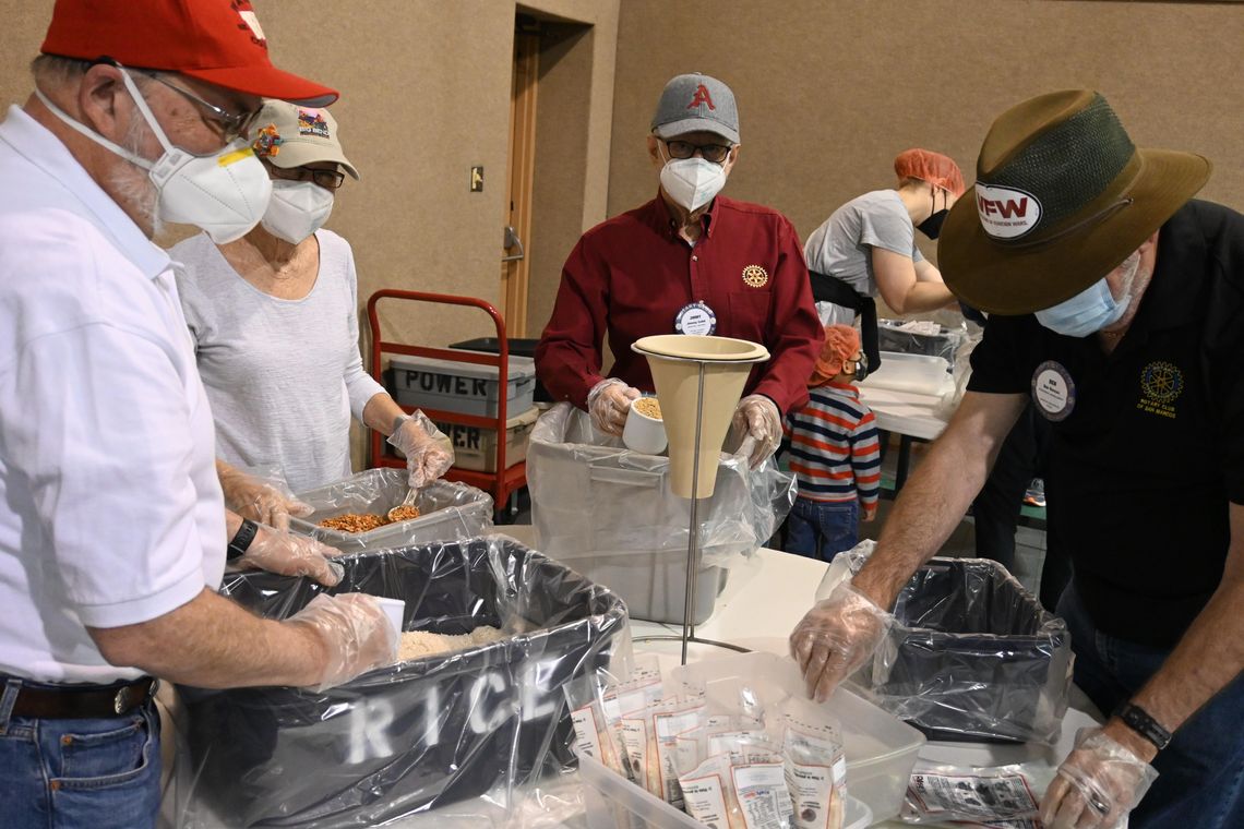 150 volunteers help Rotary pack 15,000 meals on World Food Day 150 volunteers help Rotary pack 15,000 meals on World Food Day