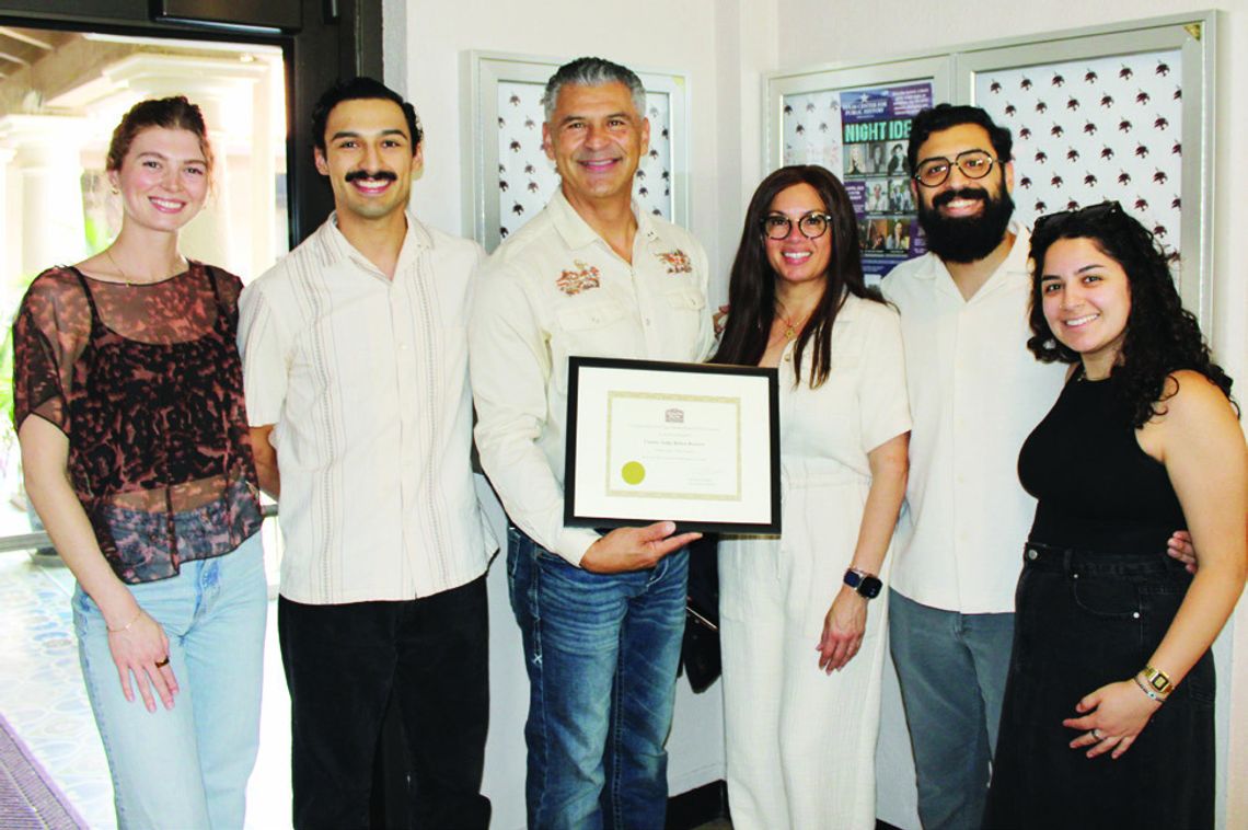 Becerra receives public service award