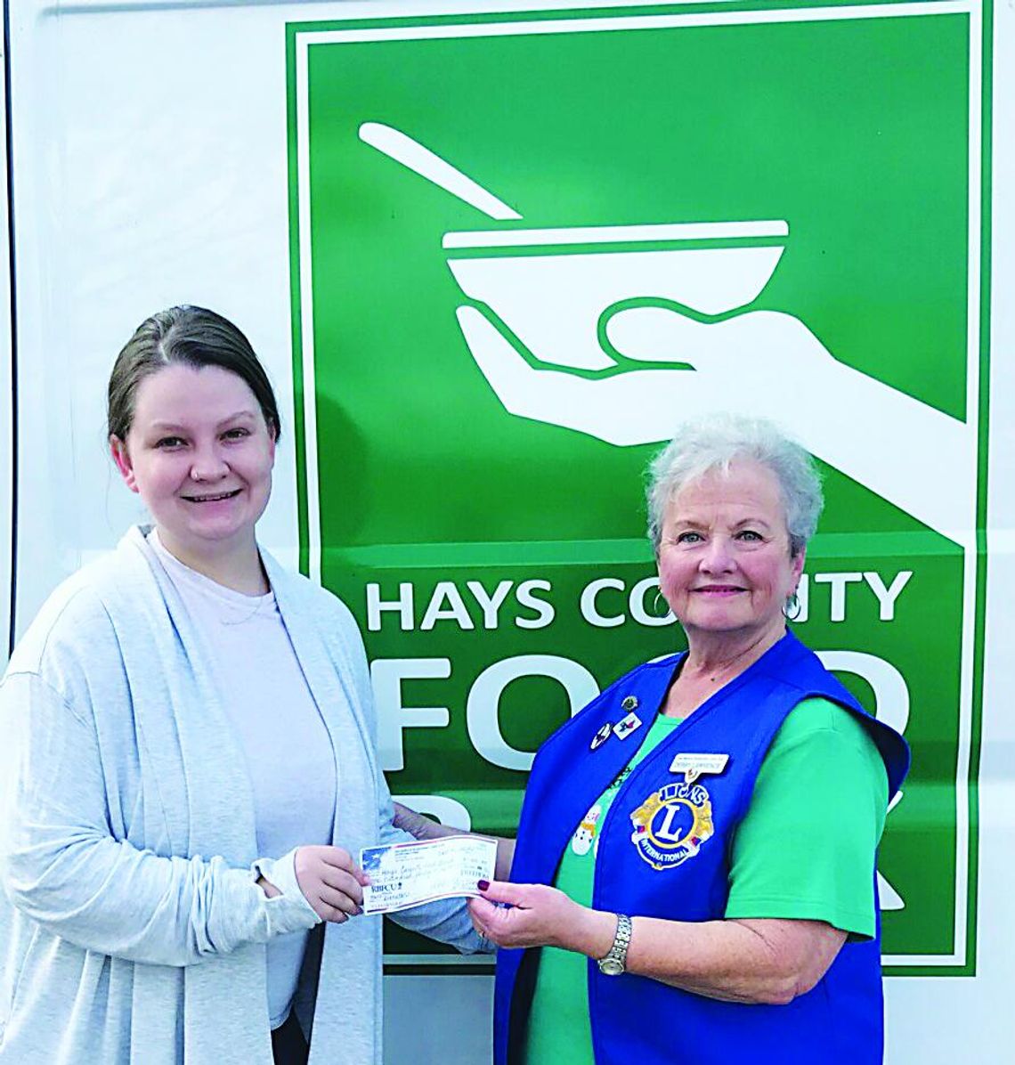 Bluebonnet Lions Club presents donation to Hays County Food Bank Bluebonnet Lions Club presents donation to Hays County Food Bank