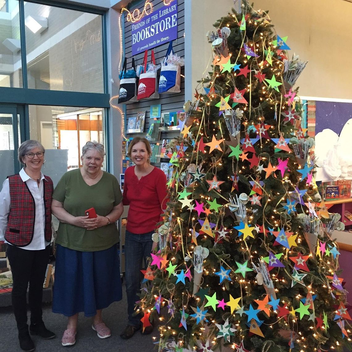 Bluebonnet Lions help decorate Christmas tree at San Marcos Public Library