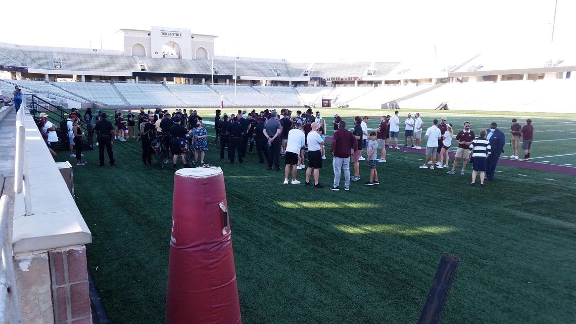 Bobcats, law enforcement march in solidarity