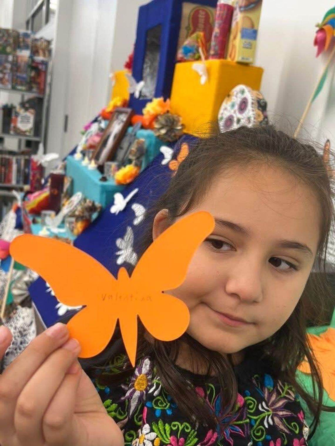 Community ofrenda and children’s classes help honor loved ones