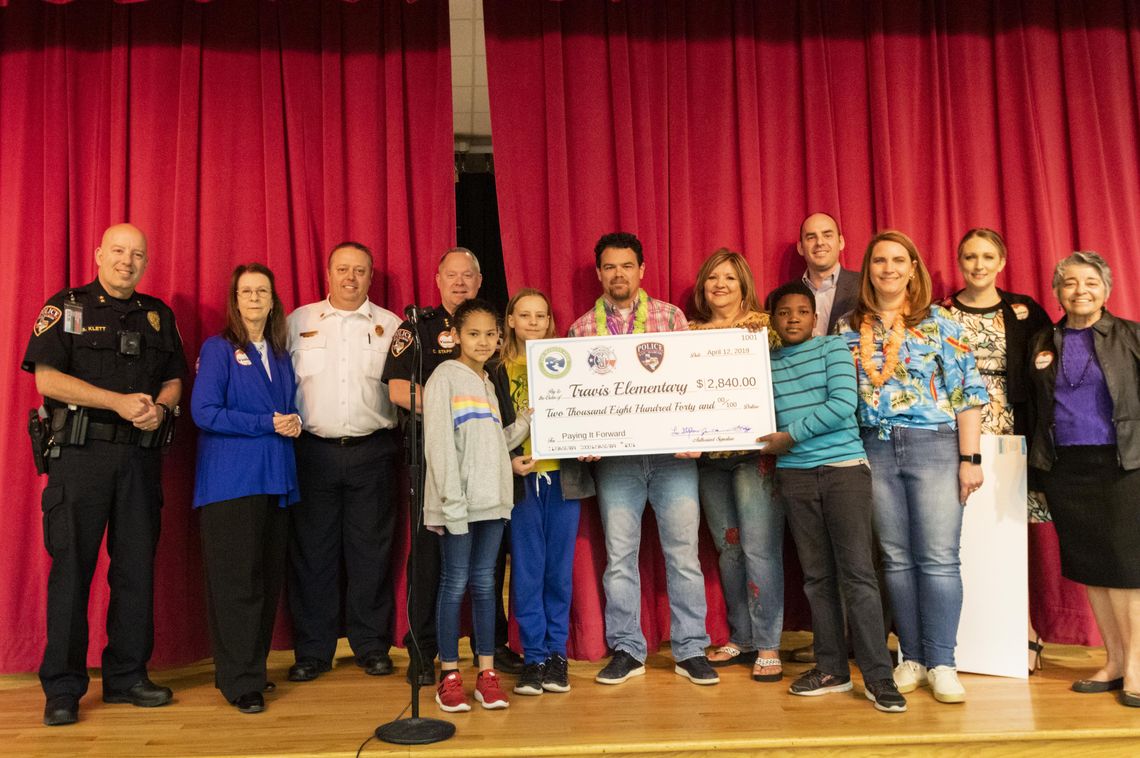 Fire, police donate to Travis Elementary