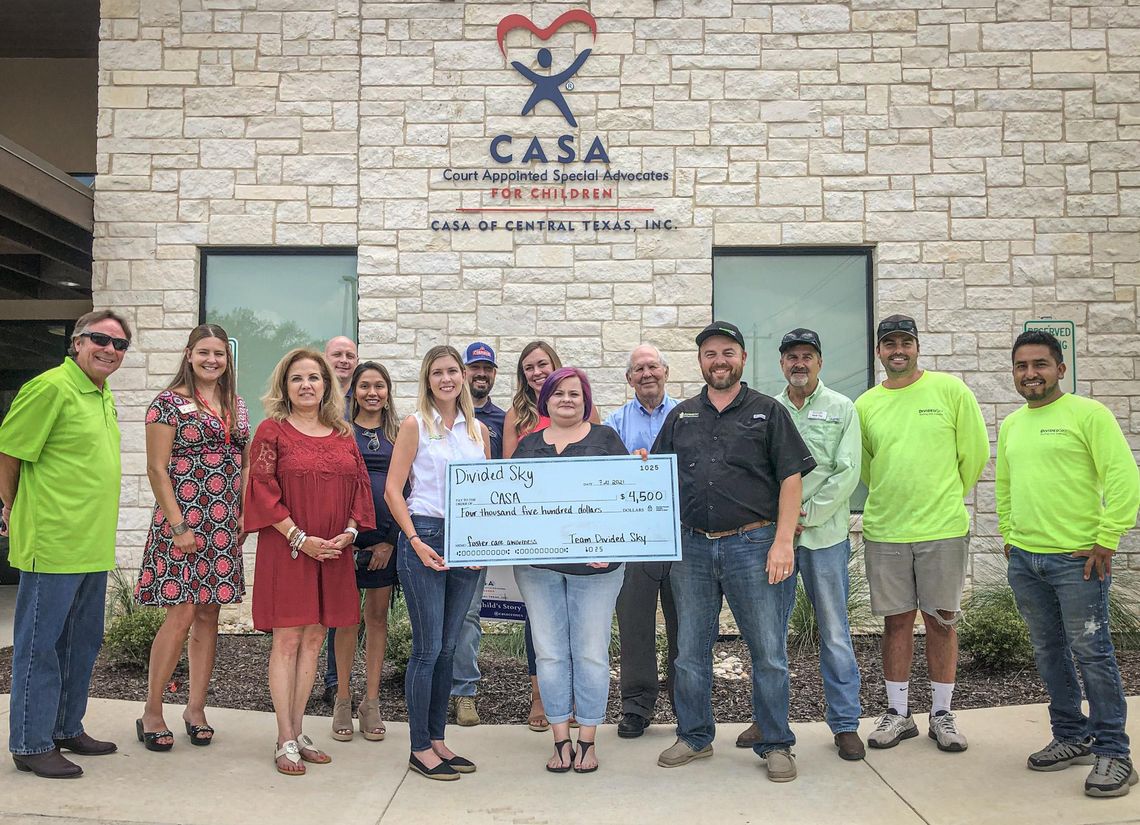 FOR THE CHILDREN: Divided Sky Roofing, Rotary Club make donations to CASA FOR THE CHILDREN: Divided Sky Roofing, Rotary Club make donations to CASA