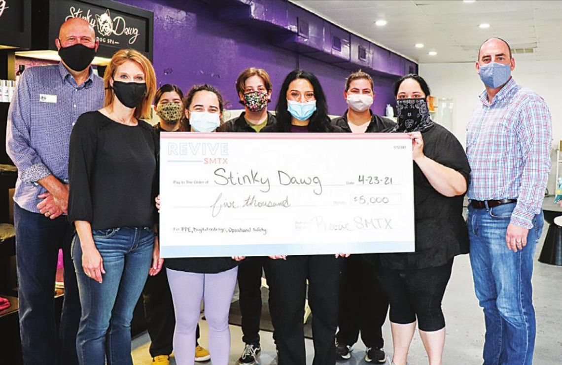 Local businesses receive Revive SMTX checks Local businesses receive Revive SMTX checks